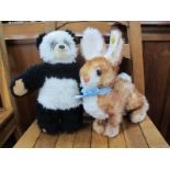Two Steiff Soft Toy Animals, comprising of a circa 1960's "Ossi" Rabbit, brown eyes, blue bow,