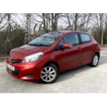 2012 [WL12 PAO] Toyota Yaris 1.3 VVT-i petrol 5-door in metallic red, manual gearbox, 14,801