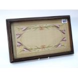 An Early XX Century Embroidered Panel on Silk, in mahogany frame, 35cm x 22cm.