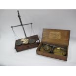 A Mid XIX Century Balance Scale and Weights, in an oak case with label for 'De Grave, Short and