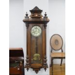 A XIX Century Walnut Cased Viennese Wall Clock, double weighted, eight day movement.