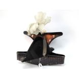 A Cased Circa XIX Century Naval Officers Bicorn Hat, with white feathers, in japaned metal case.