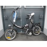 A Dillenger Folding Electric Bike, with two keys and power charger.