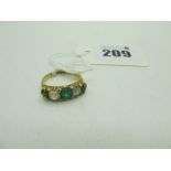 An 18ct Gold Emerald and Diamond Five Stone Ring, claw set with old cut diamonds, Birmingham 1903 (