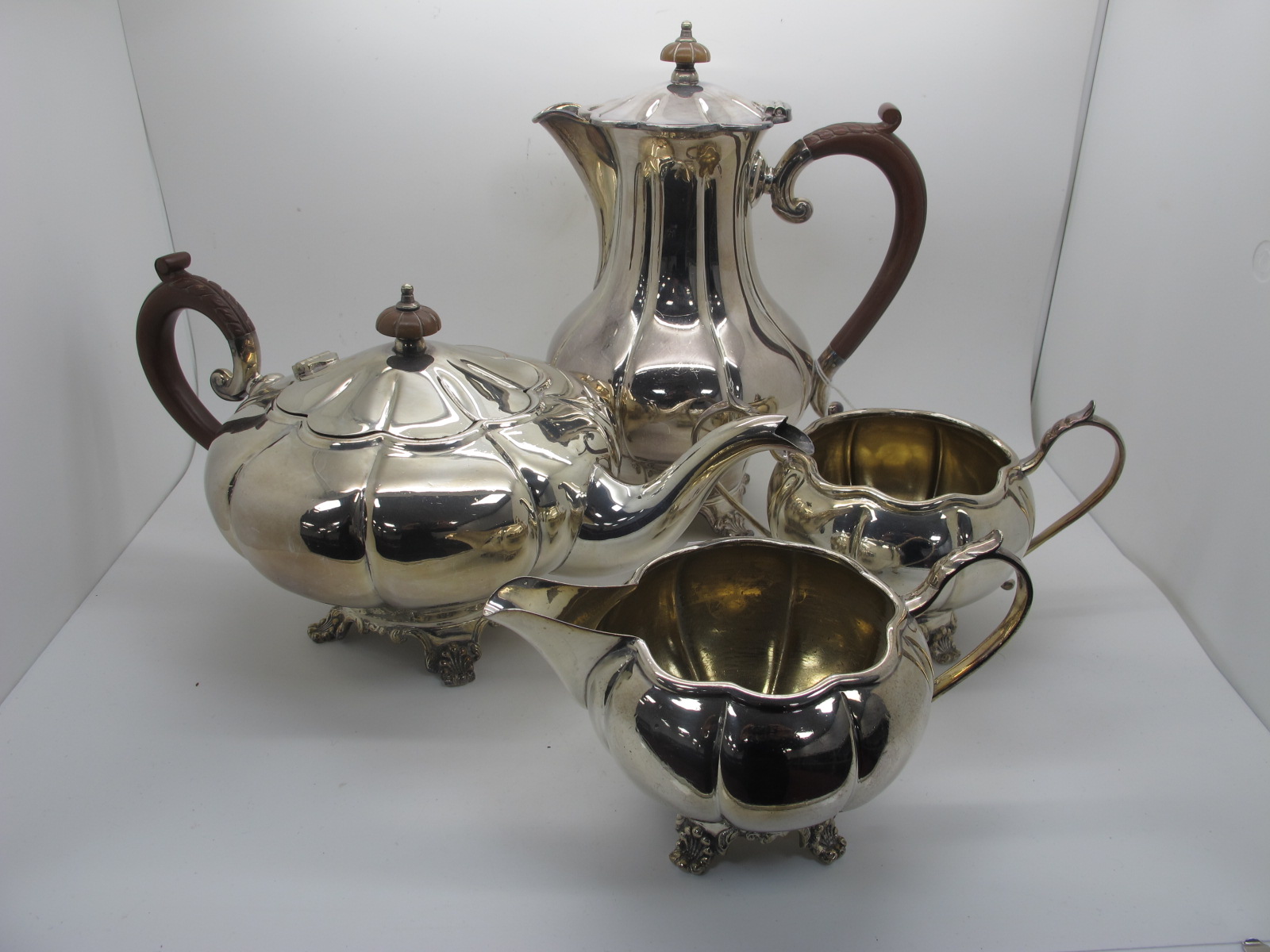 A C.S. Green & Co Ltd 'Reproduction Old Sheffield Plate' Four Piece Plated Tea Set, each of lobed