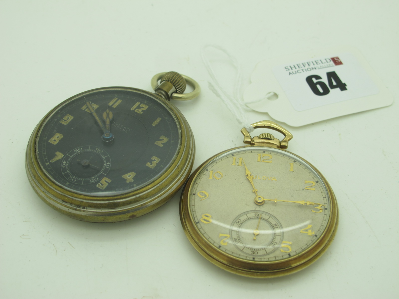 Bulova; A 10K Rolled Gold Plate Slim Cased Openface Pocketwatch, the signed dial with Arabic