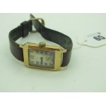 A Vintage 9ct Gold Cased Wristwatch, the rectangular dial with blue Arabic numerals and seconds
