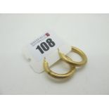 A Pair of Modern Hoop Earrings, textured finish, stamped "375" (2.7grams).