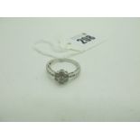 A Modern 9ct White Gold Diamond Cluster Ring, illusion set, stamped .51" (finger size O) (2.3grams).