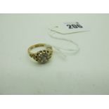 An 18ct Gold Diamond Set Ring, set with old cut stones, Birmingham 1910 (finger size N) (3grams).