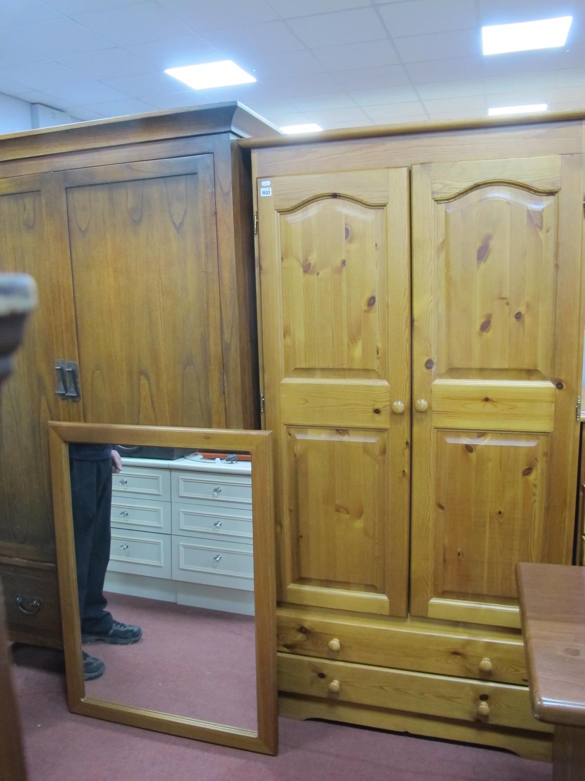 A Pine Wardrobe with twin panelled doors over two long drawers, 94cm x 83cm high, plus a wall
