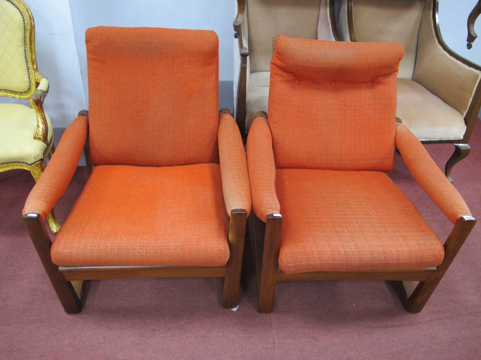 A Guy Rodgers Pair of Vintage Teak Wood Armchairs, with upholstered backs, seats, arms.