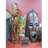 Amos Chon Carved African Hardwood Figural Group, 67cm high, two masks and three monkeys group. (4).