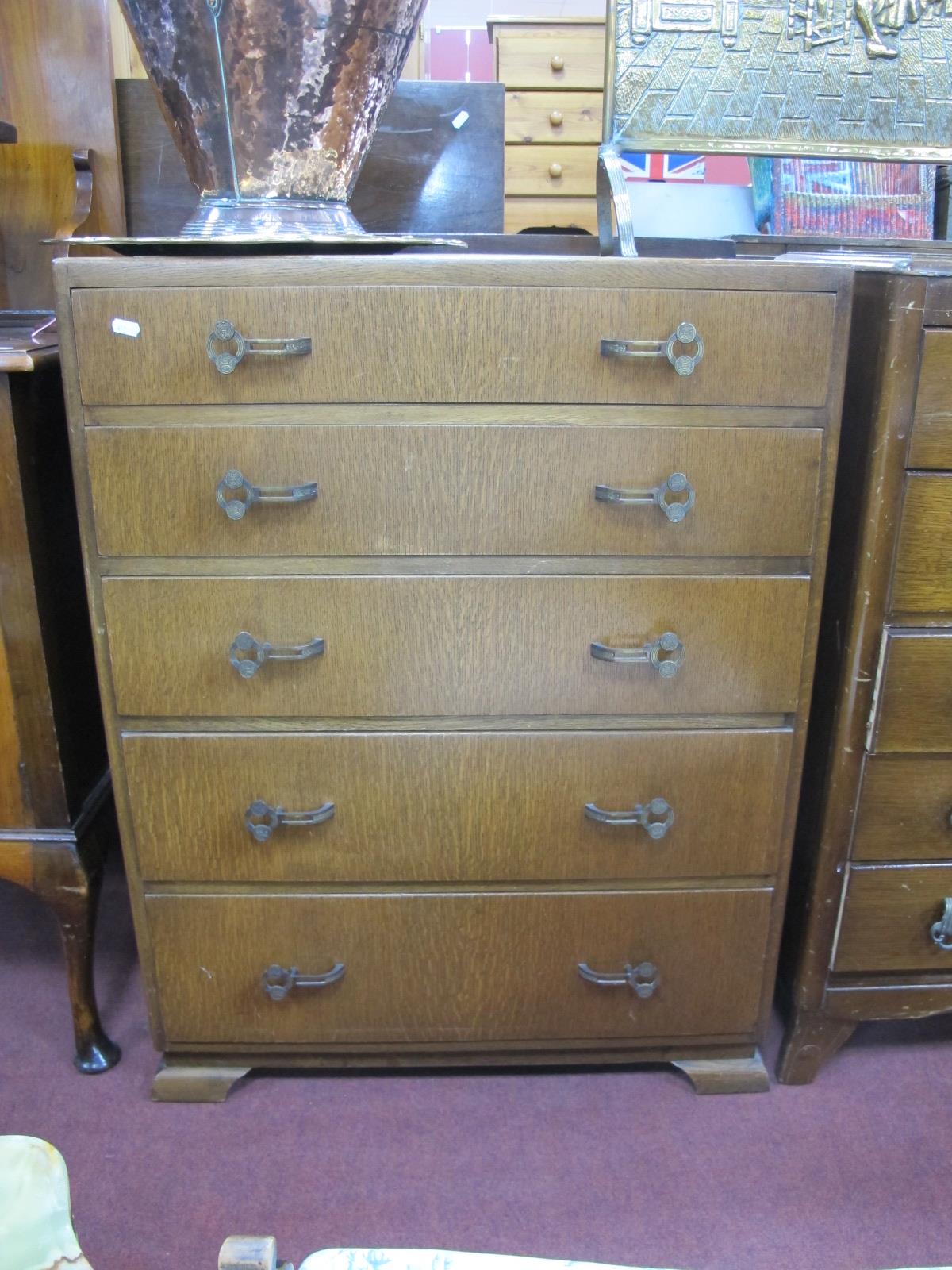 A XX Century Oak Chest of Drawers, low back with five drawers, on shaped feet, 76cm.