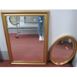 A Gilt Framed Rectangular Wall mirror, 106 x 75.5cm, oval smaller example. (2).