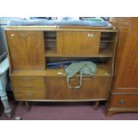 Teak Lounge Sideboard, with sliding doors (lacking handles), to high back over twin cupboard doors