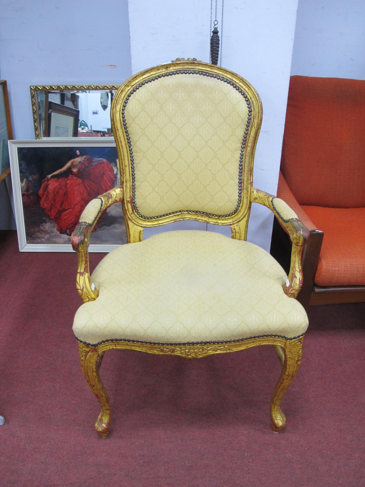 A Modern XIX Century French Style Gilded Armchair, with upholstered back, arms and seat, on cabriole