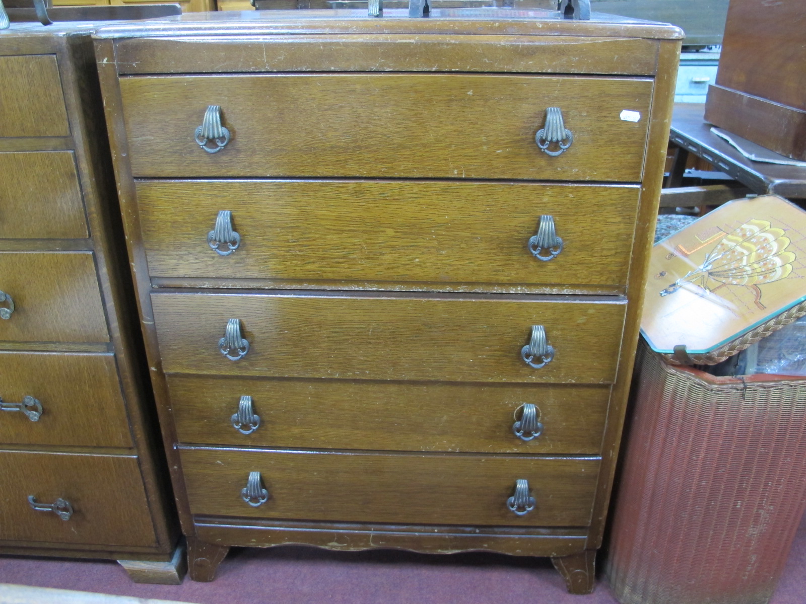 A XX Century Oak Chest of Drawers, with five long drawers, 76cm wide.