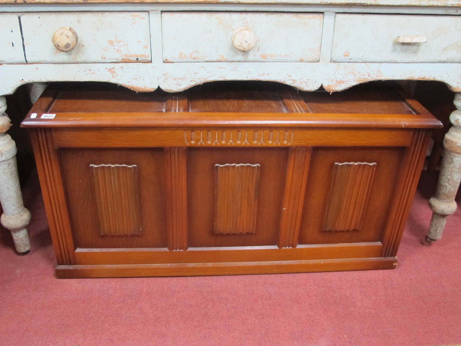 A XX Century Oak Blanket Box, with a hinged lid, linen fold panels, 107cm wide.