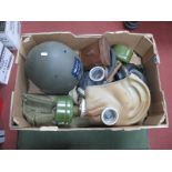 Three Russian Gas Masks, British gas mask plus three filters and a British Army combat helmet, all