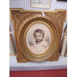 An Early XX Century Sepia Photograph of Infant Child, oval, in decorative gilt frame, Marius,