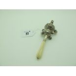A Decorative XIX Century Ivory Handled Baby's Rattle, with whistle and six bells (one missing) and