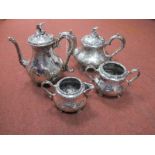 A Cooper Brothers Electroplated Four Piece Tea Set, with bird of prey finials and foliate and scroll
