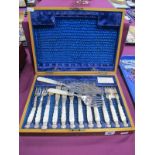 A Highly Decorative Set of Six Mother of Pearl Handled Fish Knives and Forks, with hallmarked silver