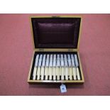 A Set of Twelve Victorian Ivory Handled Decorative Knives and Forks, with hallmarked silver