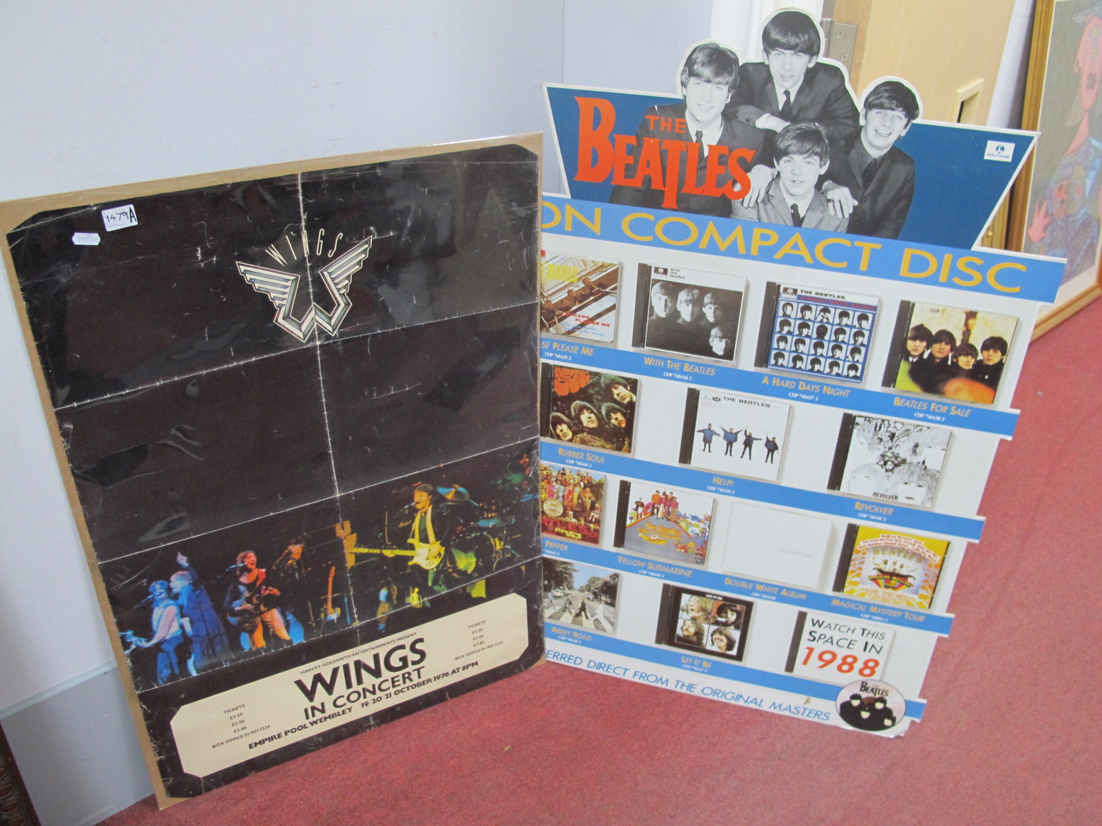 The Beatles. Promo CD Poster, in card, 101cm tall; Wings 1976 tour poster, 83.5 x 59cm. (2)