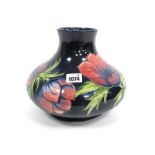 A Moorcroft Pottery Vase, of squat globular compressed form, painted in the Anemone pattern