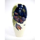 A Large Moorcroft Pottery Vase, of extended ovoid form, painted in the Clematis pattern with