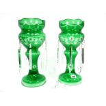 A Pair of Early XX Century Green Flashed Glass Table Lustres, with cut decoration and hung with