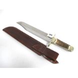 Stan Shaw; A Bowie Knife, stag handle with nickel silver bolsters, crossguard and pommel, with