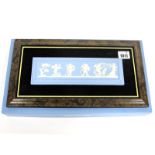 A Wedgwood Jasper Ware Pottery Plaque 'The Four Seasons', applied with cherubs within a moulded