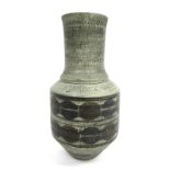 A Troika Pottery Vase, of baluster form, the central cylindrical body painted by Ann Lewis, signed