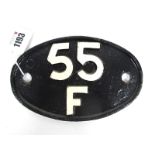 Railwayana; A 55 F Works Plate, painted in black with white lettering and of oval form, 11.5 x