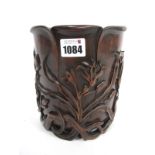 A Chinese Hardwood Vase/Brush Pot, carved with flowering branches and of cylindrical form, 17cm