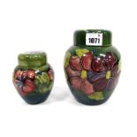 A Moorcroft Pottery Ginger Jar and Cover, of ovoid form painted in the Anemone pattern against a