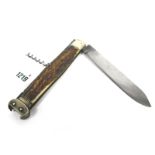 A Lock Knife, (unnamed), with single blade, corkscrew and nickel silver cartridge extractor,