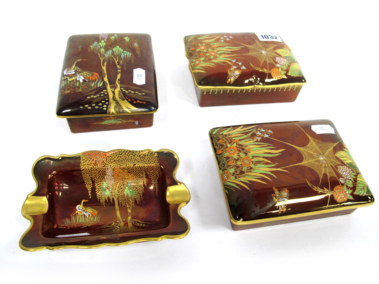 A Pair of Carlton Ware Pottery Rouge Royale Cigarette Boxes and Covers, each decorated in enamels