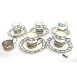 A Set of Five Aynsley Porcelain Coffee Cans and Saucers, decorated in black with scrolls and flowers