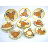 A Collection of Newport Pottery/Wilkinson's Clarice Cliff Crocus Pattern Plates and Bowls, to