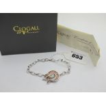 Clogau; A Modern Two Tone Bracelet, to T-bar and decorative loop fastener, stamped "925", in