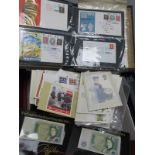 A Large Box of G.B Mint PHQ Cards, FDC's, Stamp Booklets, Match Covers, and G.B £1 notes and decimal