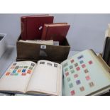 A Worldwide Stamp Collection, housed in four post WWII albums, plus a few loose covers.