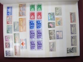 A Collection of Mint British Commonwealth Stamps Housed in a Green Stock Book, mainly GVI - QEII,