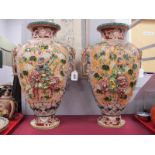 A Pair of Oriental Satsuma Vases, each with Chrysanthemum and scroll decoration, with Samurai