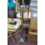 Brass Corinthian Column Standard Lamp, on square base and four paw feet.