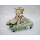 A Peggy Davies Ceramic Sculpture of 'Amorous Couple', 25cm long.
